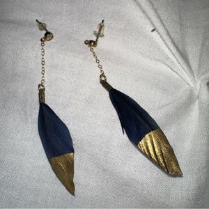Gold and feather earrings worn once
